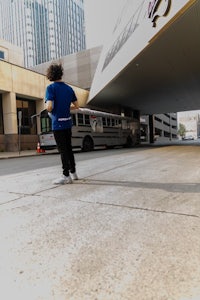 a man on a skateboard in front of a building